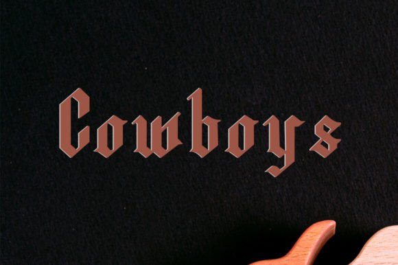 Cowboys: A Bold Graffiti Blackletter Typeface for Edgy Branding